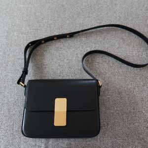 Classic Black Leather Crossbody with Gold Accent